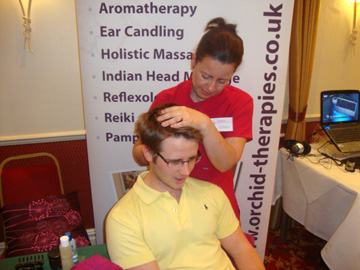 Liz giving an Indian Head Massage at the BCTC Wellbeing event